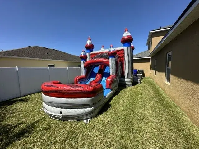 All American bounce house with slide from Millers Jump Time